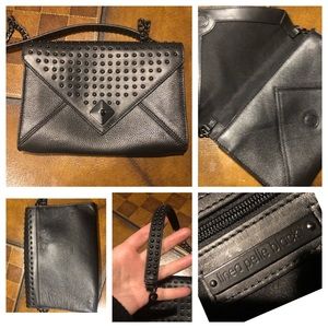 Linea Pelle grommet dress bag black